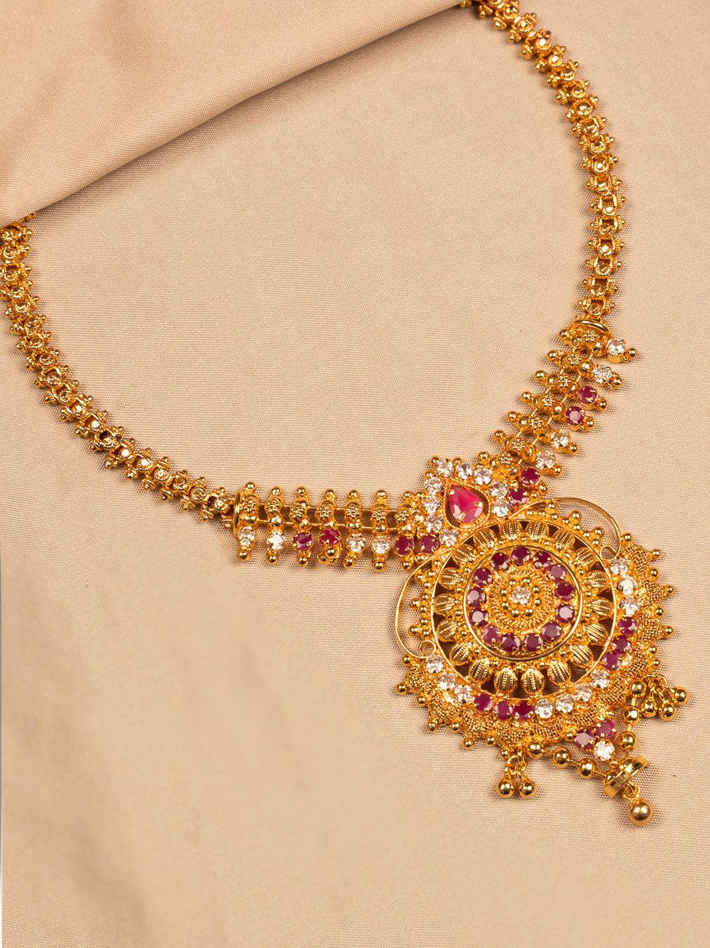 Royal Ruby-Studded Traditional Gold Necklace with Intricate Pendant