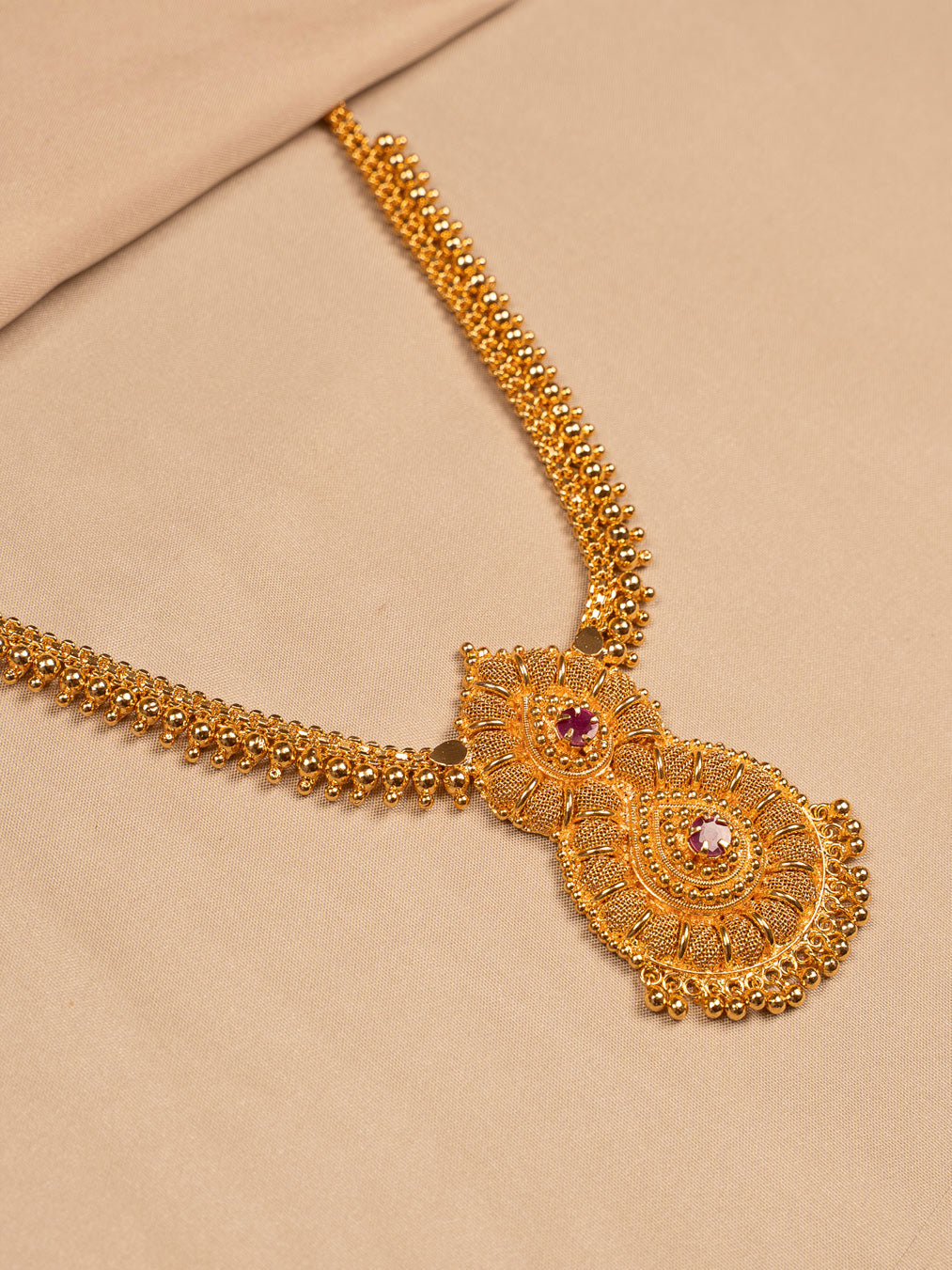 Dual Paisley Gold Pendant Necklace with Ruby Stone Accents