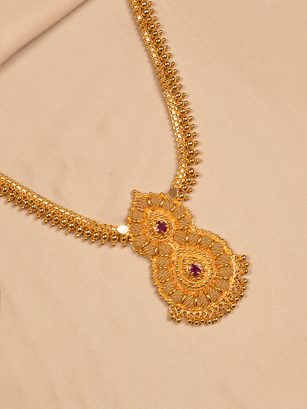 Dual Paisley Gold Pendant Necklace with Ruby Stone Accents