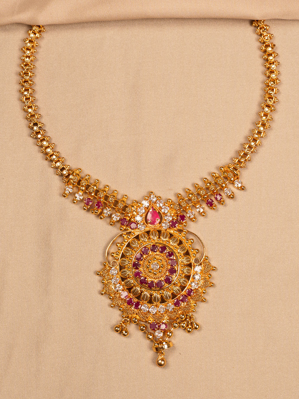 Royal Ruby-Studded Traditional Gold Necklace with Intricate Pendant