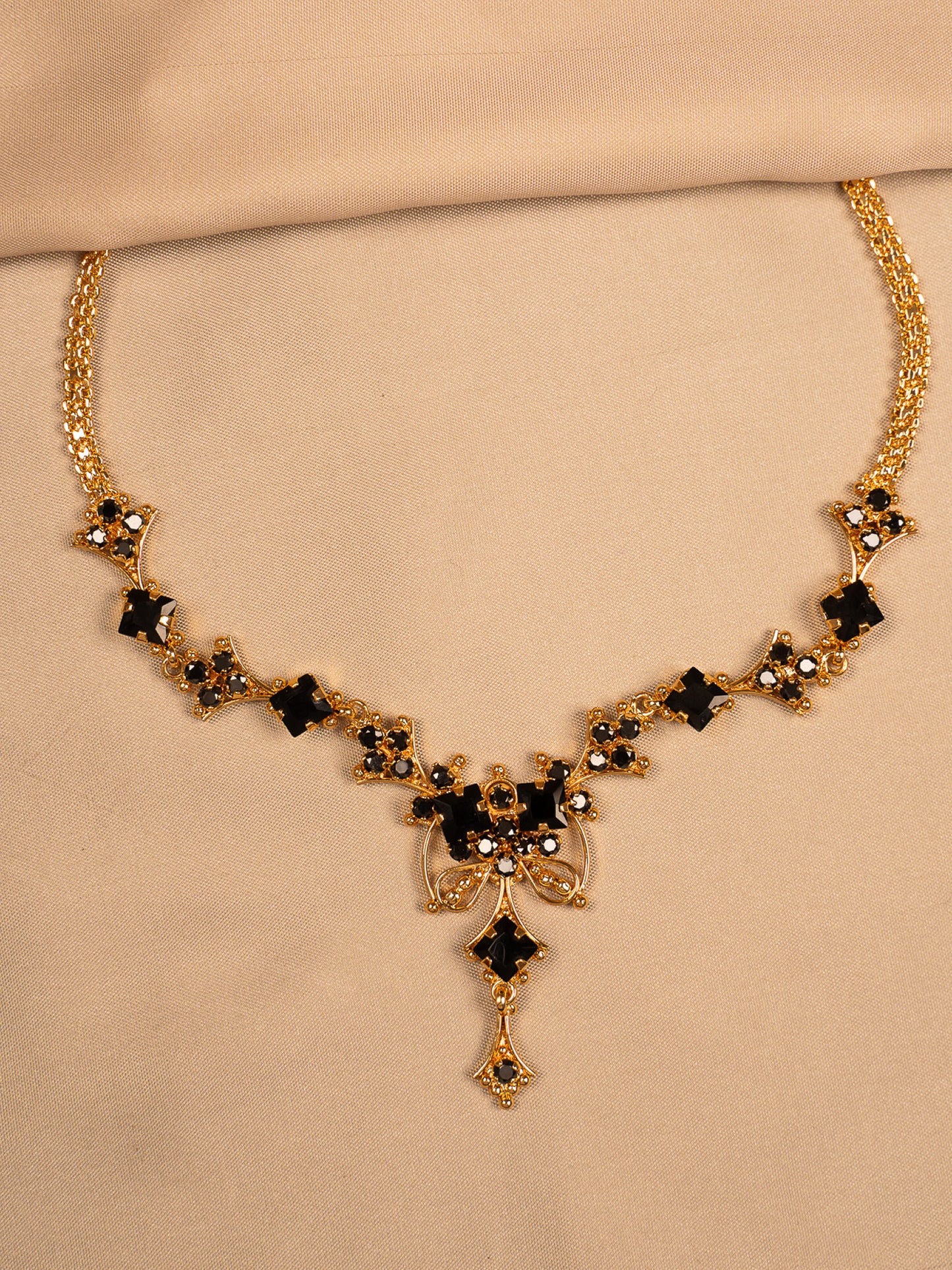 Statement Black Stone Gold Necklace with Intricate Design