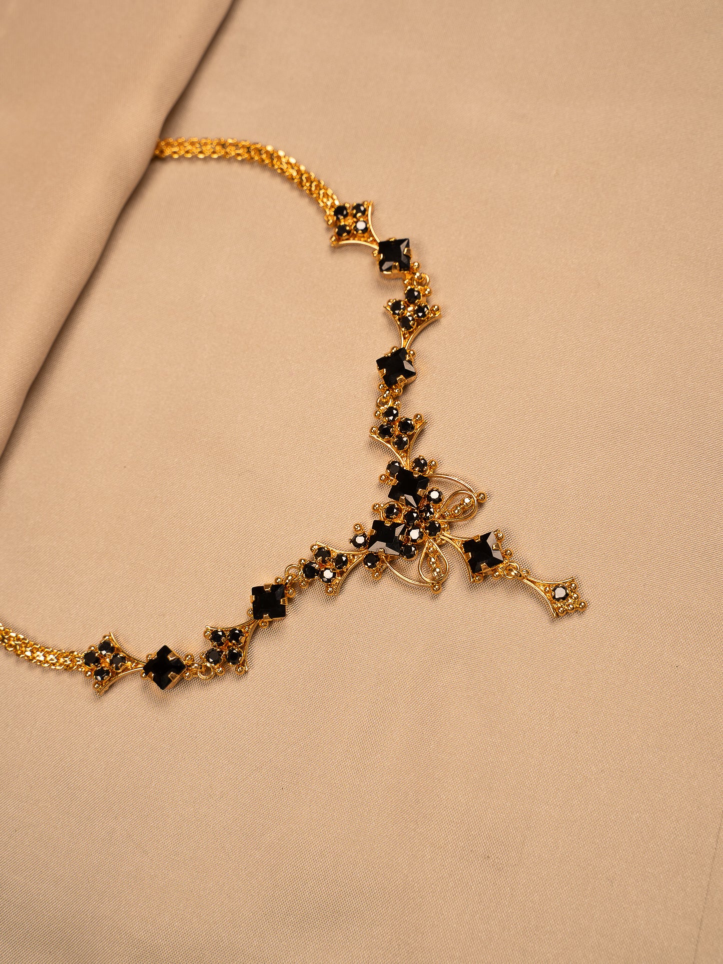 Statement Black Stone Gold Necklace with Intricate Design
