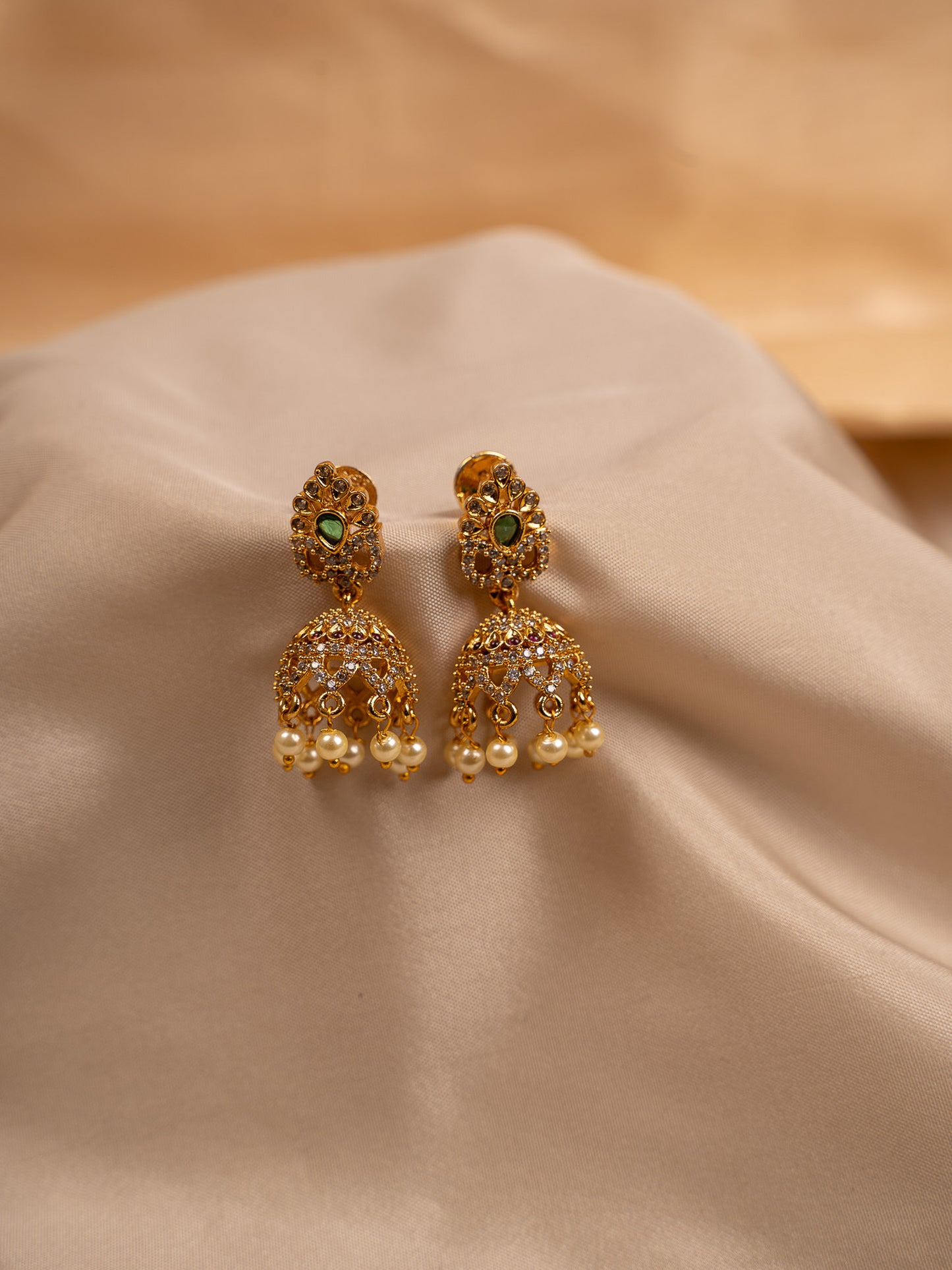 Classic Gold Jhumka Earrings with Pearl Drops & CZ Stones