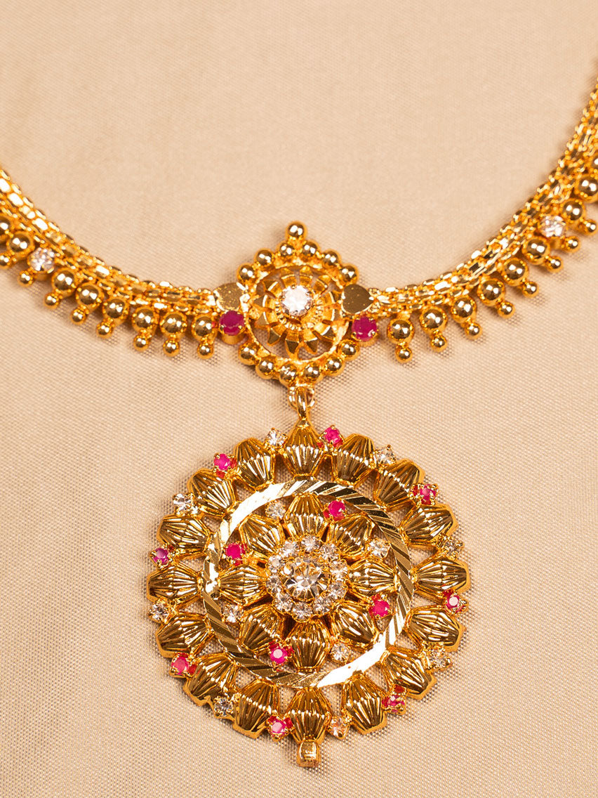Regal Floral Antique Gold Temple Necklace with Ruby Accents