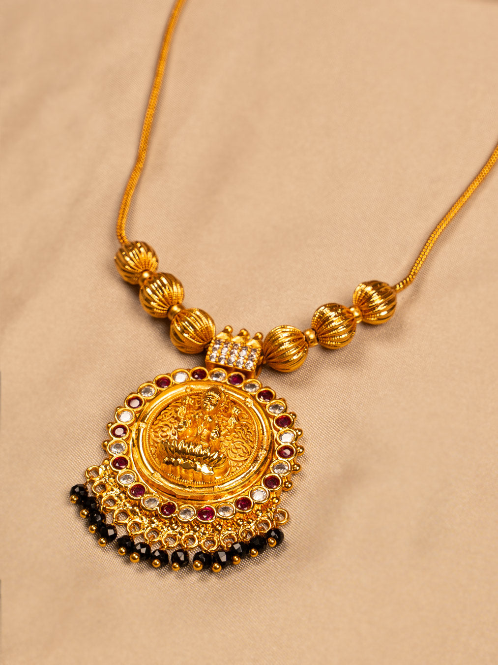 Goddess Lakshmi Gold Mangalsutra – Temple Jewellery with Black Beads