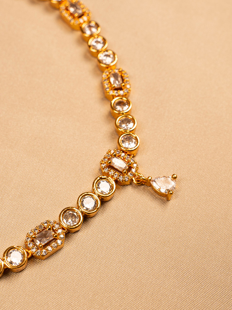 Elegant Gold-Toned Necklace Set with Clear White Stones and Earrings