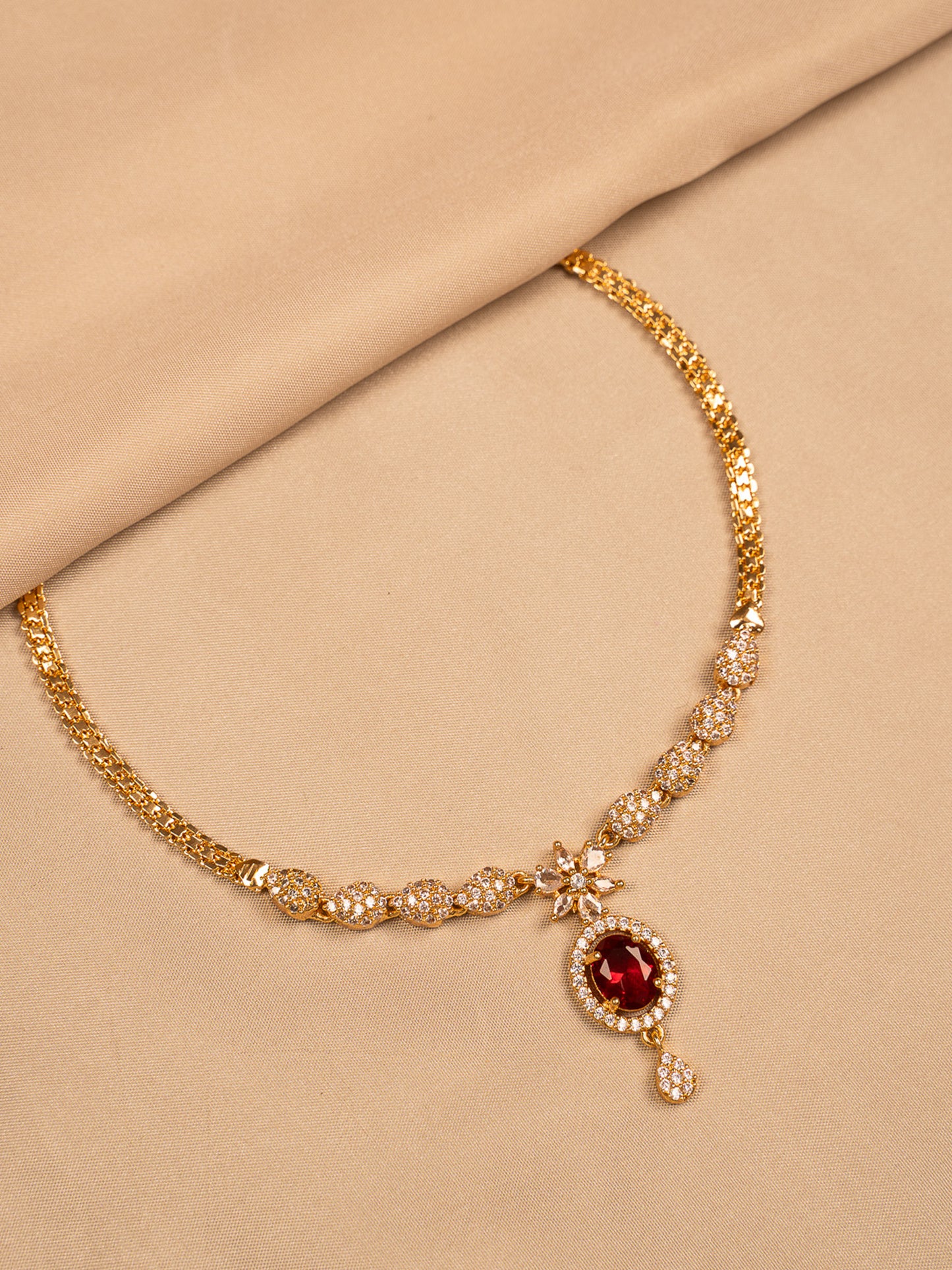 Elegant Gold Necklace with Red Stone Pendant & White CZ Detailing