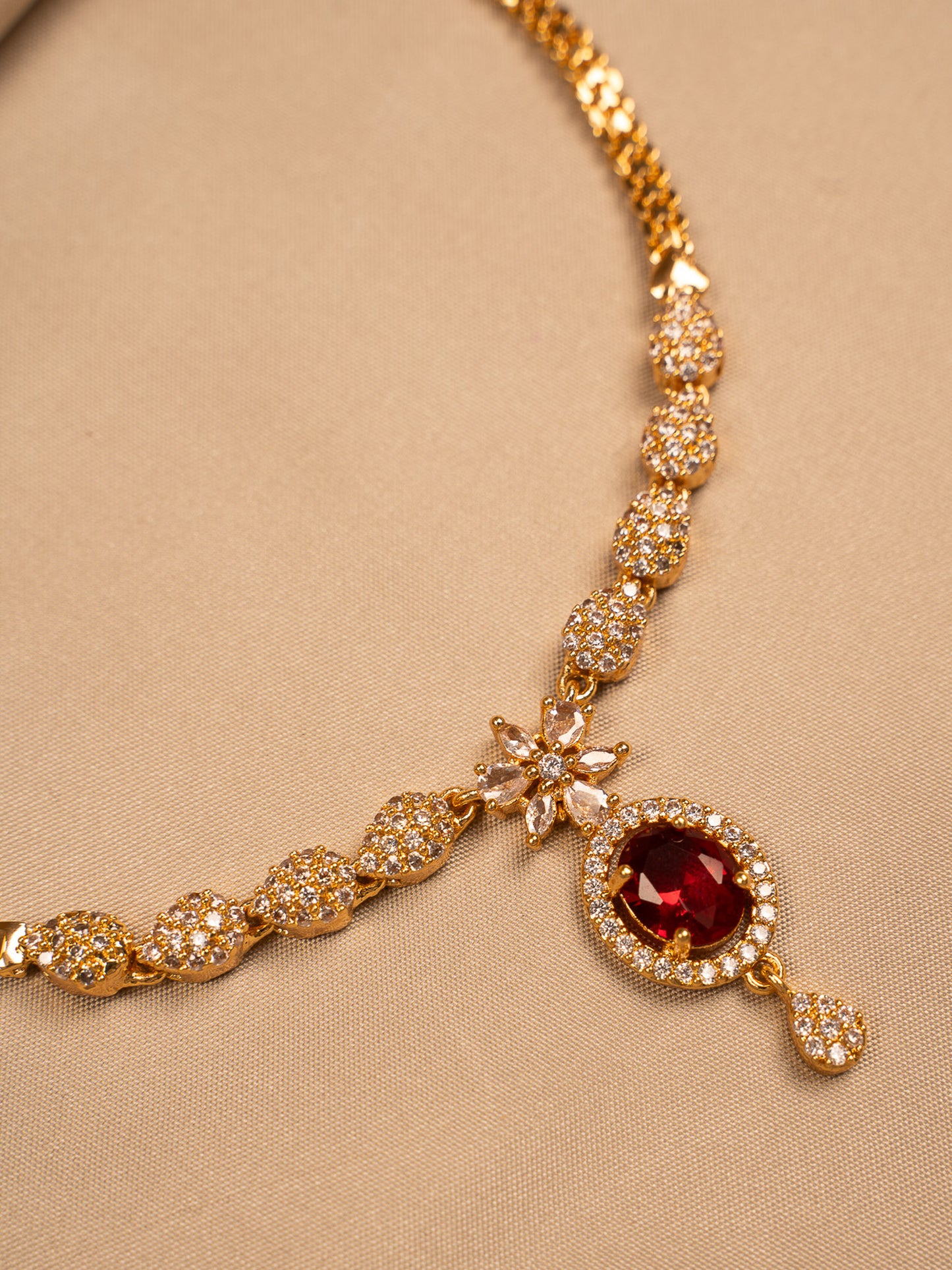 Elegant Gold Necklace with Red Stone Pendant & White CZ Detailing