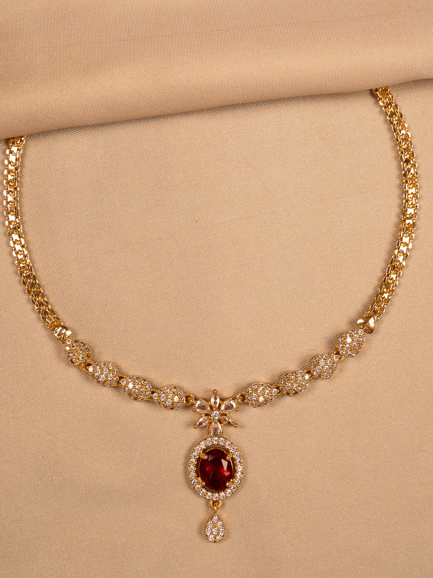 Elegant Gold Necklace with Red Stone Pendant & White CZ Detailing