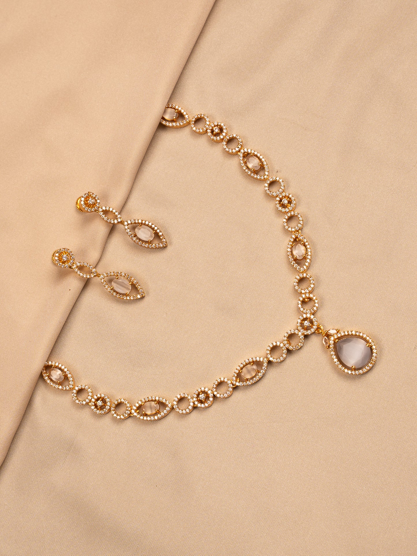 Crystal Glow Drop Necklace Set – Grey Stone & Gold Polish
