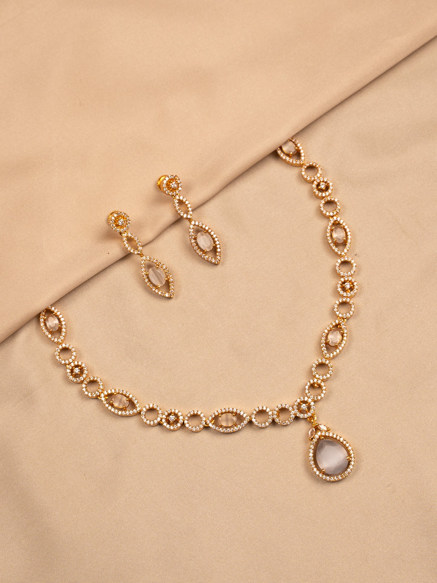 Crystal Glow Drop Necklace Set – Grey Stone & Gold Polish