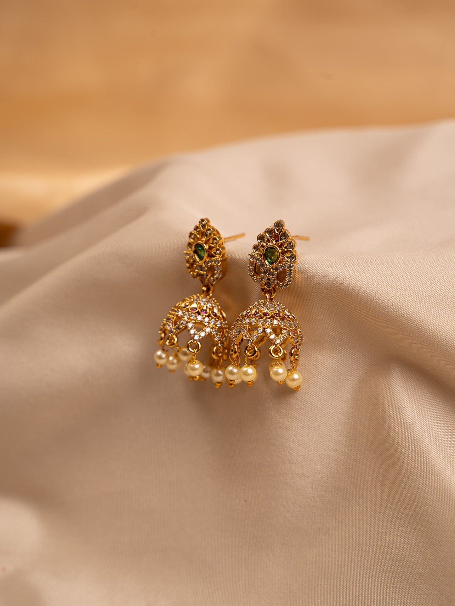 Classic Gold Jhumka Earrings with Pearl Drops & CZ Stones