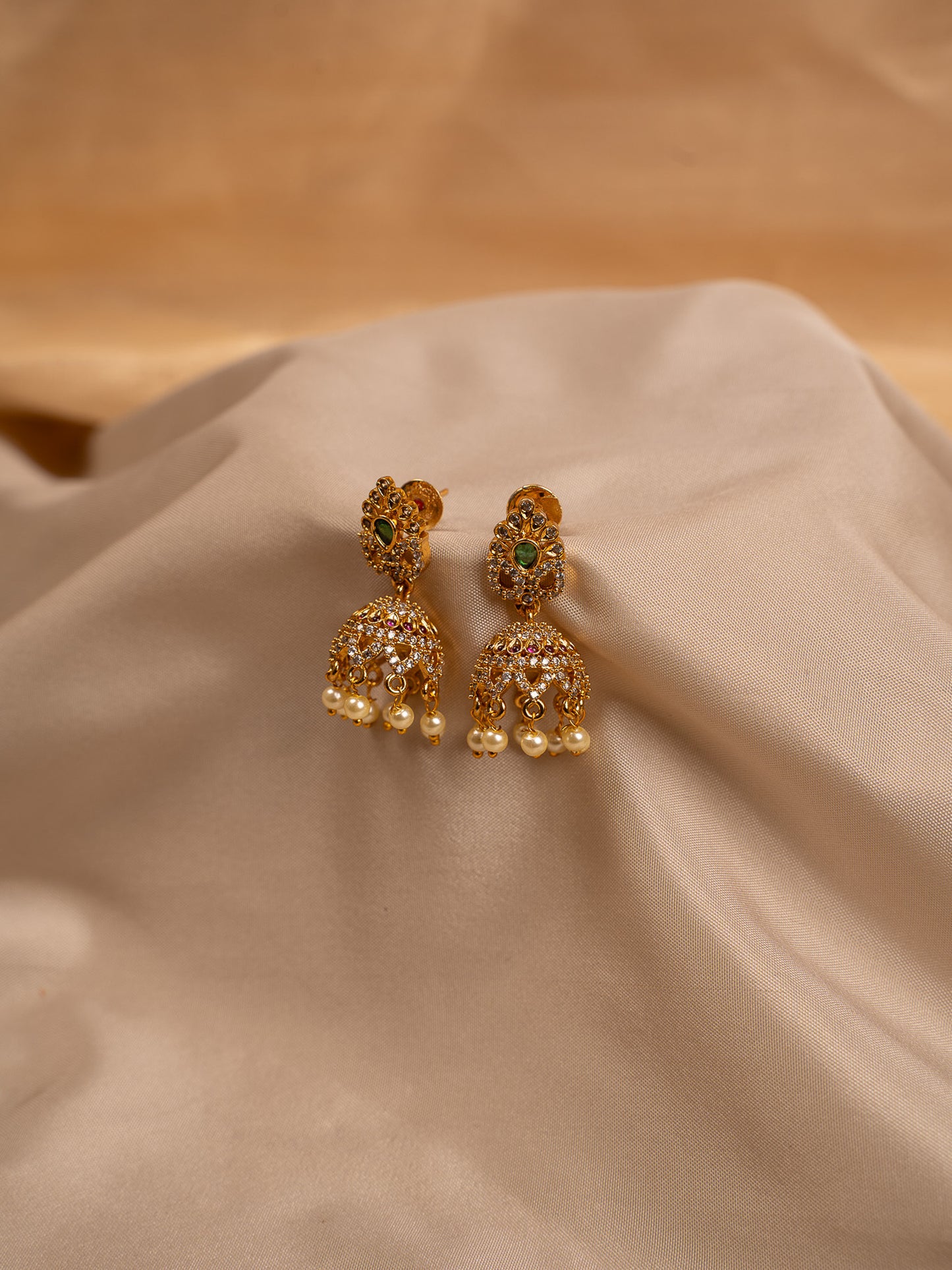 Classic Gold Jhumka Earrings with Pearl Drops & CZ Stones