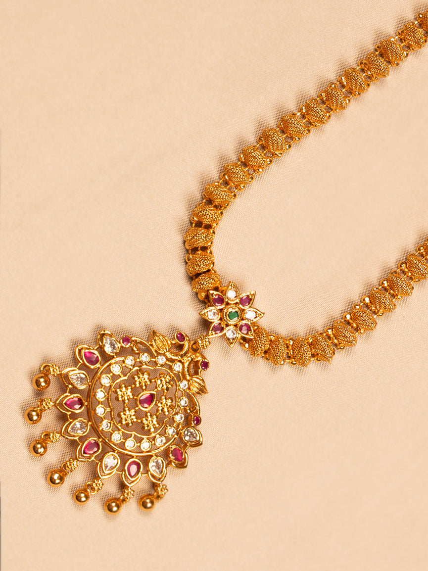 Antique Gold Temple-Style Necklace with Kundan Pendant and Beaded Chain