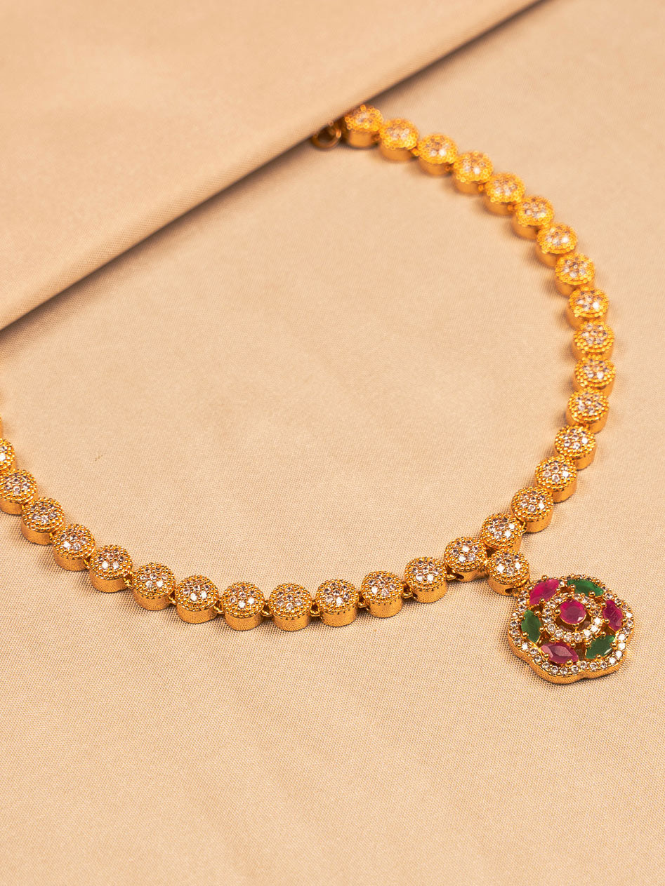 Elegant Gold-Plated Floral Necklace with Crystal and Ruby-Green Accents