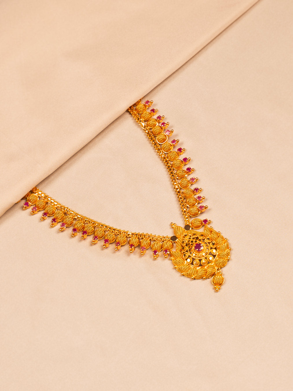 Temple-Style Red Stone Gold Necklace with Coin Motif for Women