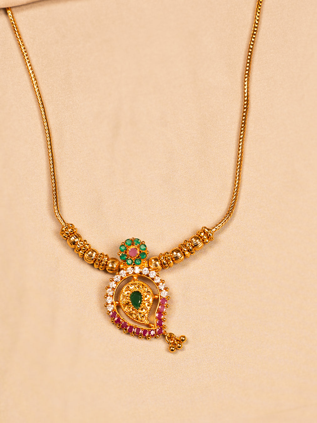 Traditional Gold Temple Necklace with Green & Red Stones – Ethnic Wear Jewellery