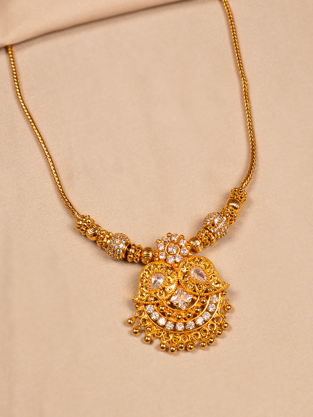Elegant Gold Necklace with White Stones – Bridal & Festive Jewelry